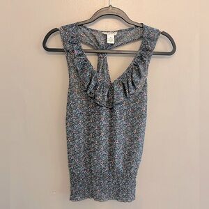 Fun and Flirt Blue floral sleeveless blouse with smocked hem size M